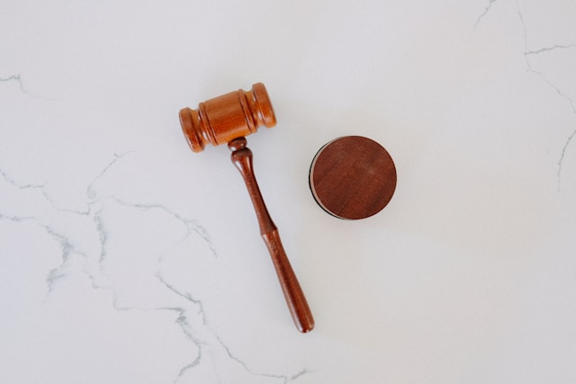 Image of a gavel on a marble desk