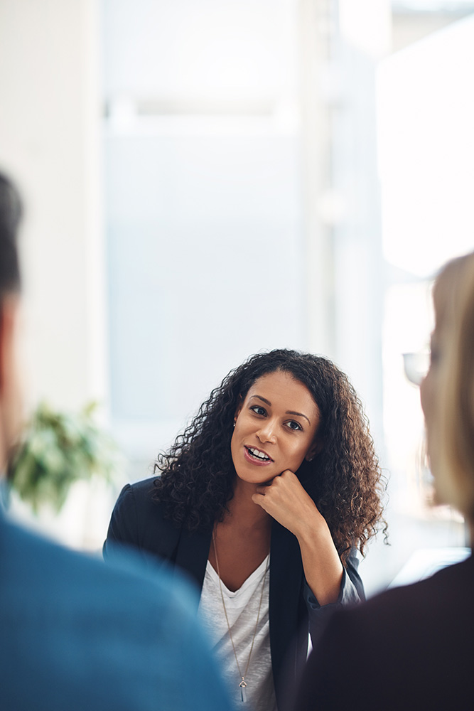 Lawyer speaks with clients